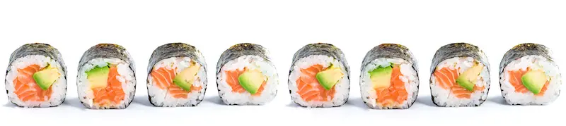 origin of sushi with traditional fresh japanese seafood sushi rolls on a white background