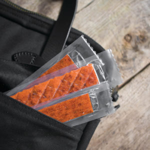 Photo of salmon jerky in attache case