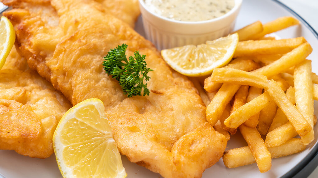 A photo of a plate of fish and chips, which have an unusual history