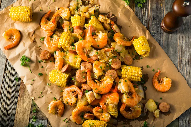 Mardi Gras seafood featuring shrimp and corn boil