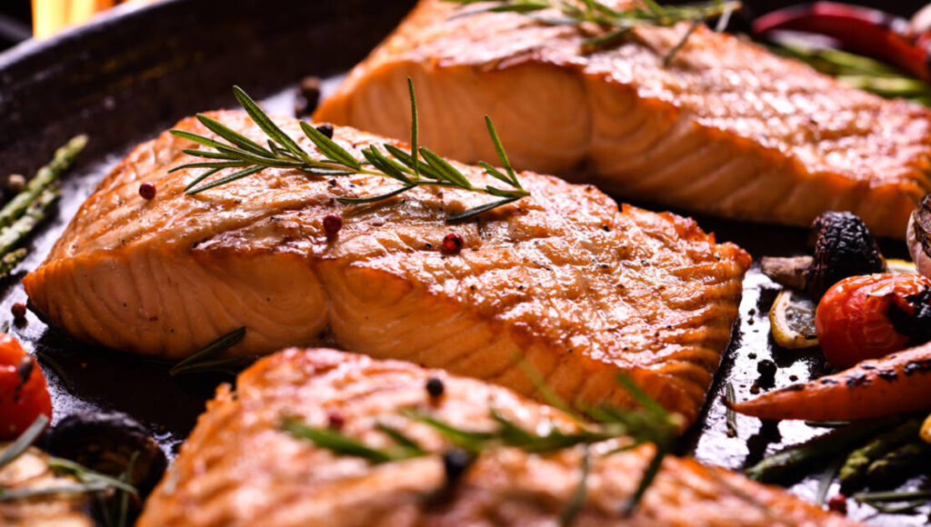 Seafood recipe ideas: salmon sauteed over open flame