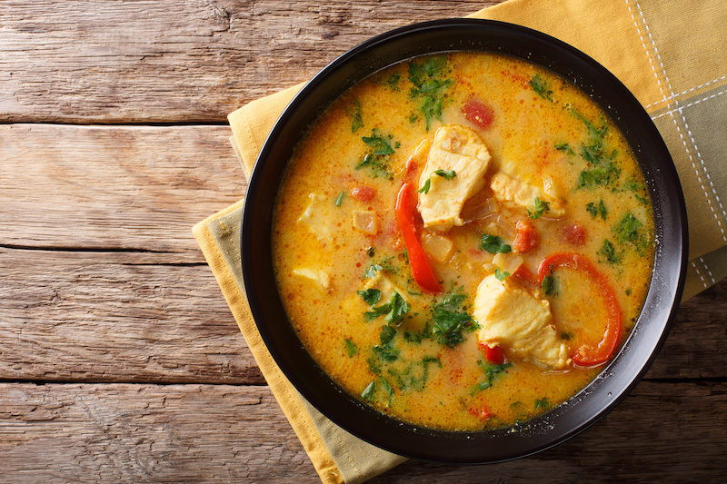 Meatless dinner ideas, Brazian stew known as moqueca in black bowl on wooden table