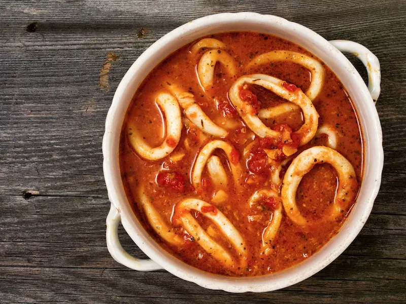 Calamari recipe, picture of seafood stew with calamari rings.