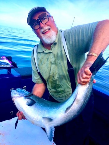 seafood business richard walsh with a king salmon he just caught