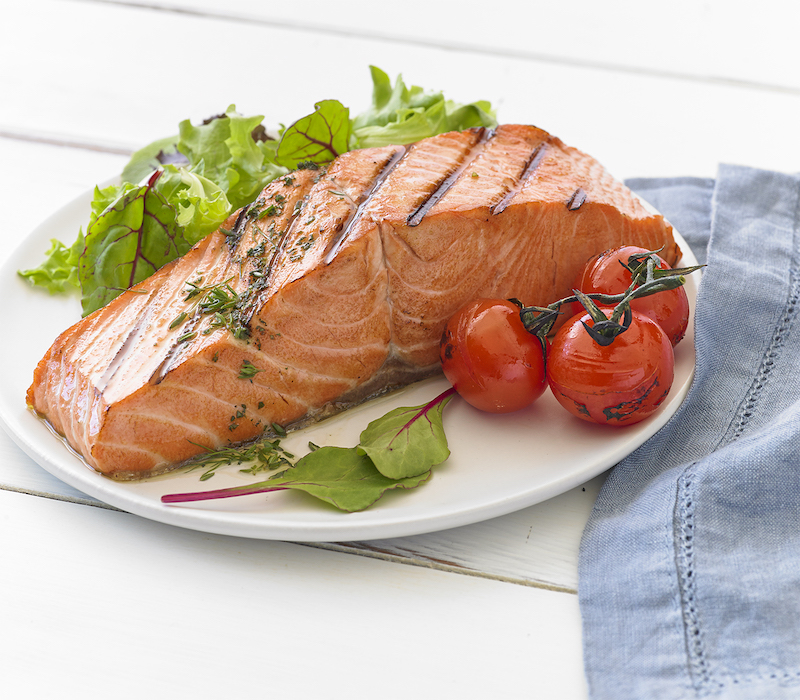 Copper River King Salmon on white plate.