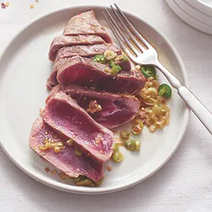 Fish recipes with a plate of ahi tuna steak slices.