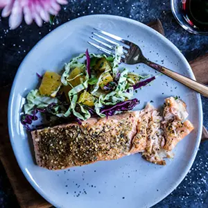 Fish recipes with a plate of Cuban salmon and slaw.