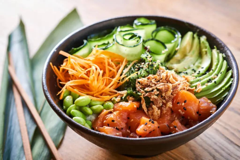 poke facts poke bowl on wooden background