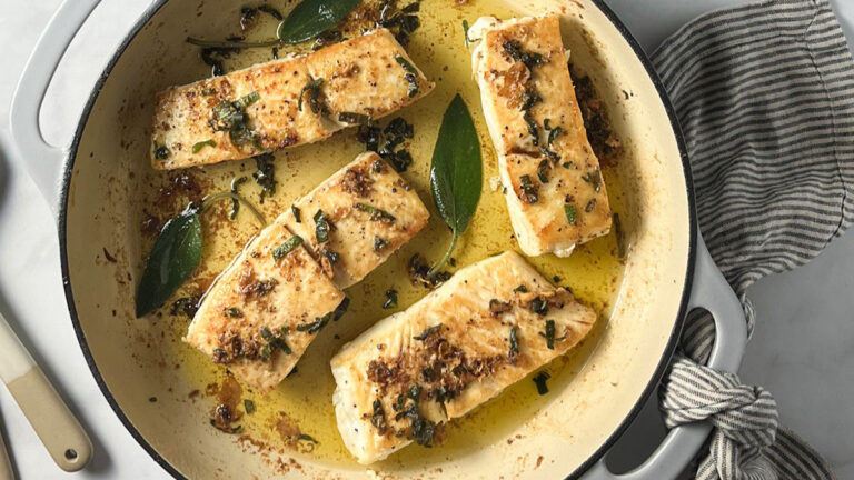 Halibut recipe in a pan with brown butter and fried sage.