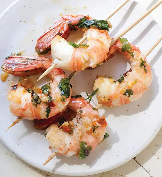 Difference between shrimp and pawns with wild pacific spot prawns on skewers.