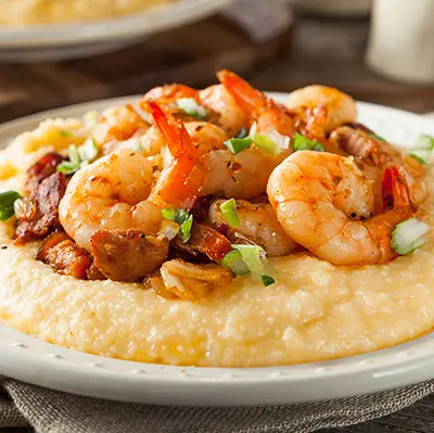 Plate of shrimp and grits.