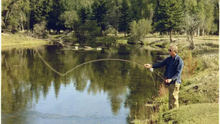 Presidents who love to fish with President Jimmy Carter casting a line into a lake.