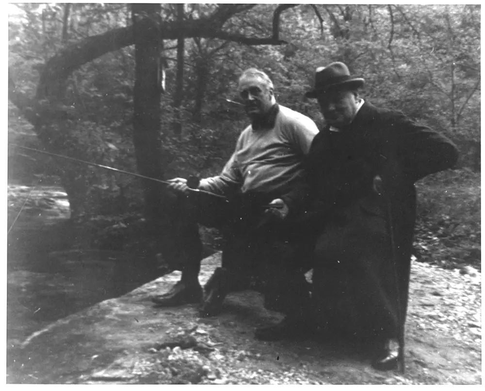 Presidents who love to fish with President Roosevelt and British Prime Minister Winston Churchill fishing at Camp David.