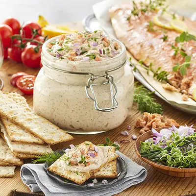 Easter fish recipes with a jar of smoked salmon dip and crackers.