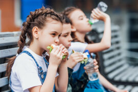 Three child eat, appetizing school lunch. Healthy school lunch: