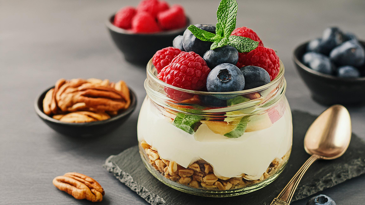 Yogurt parfait with nuts and berries.